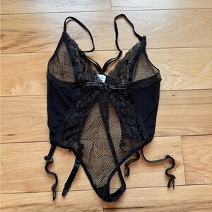 Sheer fishnet thong bodysuit